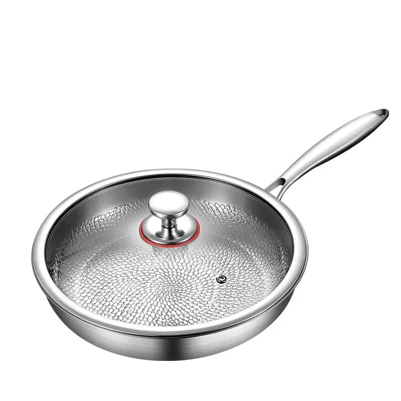 titanium frying pan with glass lid and stainless steel rim