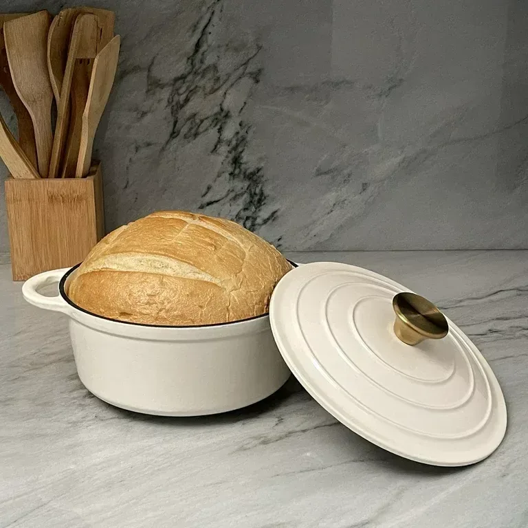 crusty loaf baked in an enameled cast iron Dutch oven