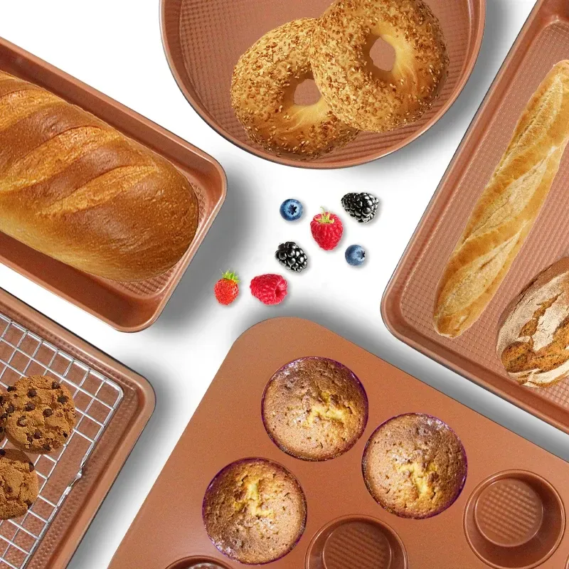 cookie sheet, muffin pan and round cake pan from the copper bakeware set