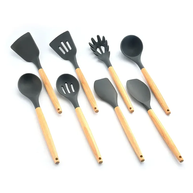 full range of silicone cooking utensils with wooden handles