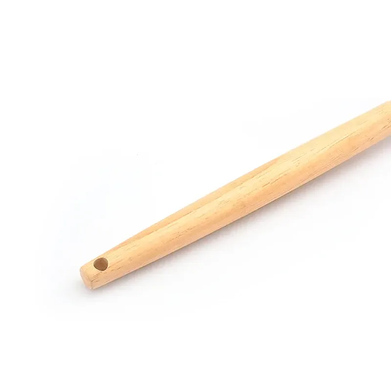wooden handle of the silicone utensil with hanging hole