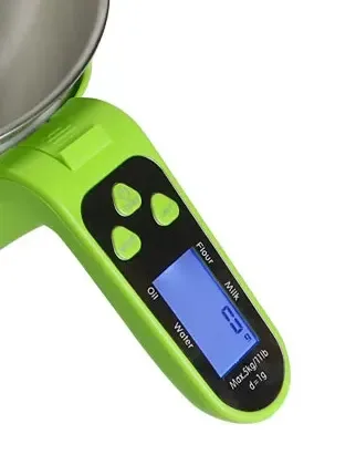 backlit display of the measuring cup kitchen scale with water, milk, oil and flour modes