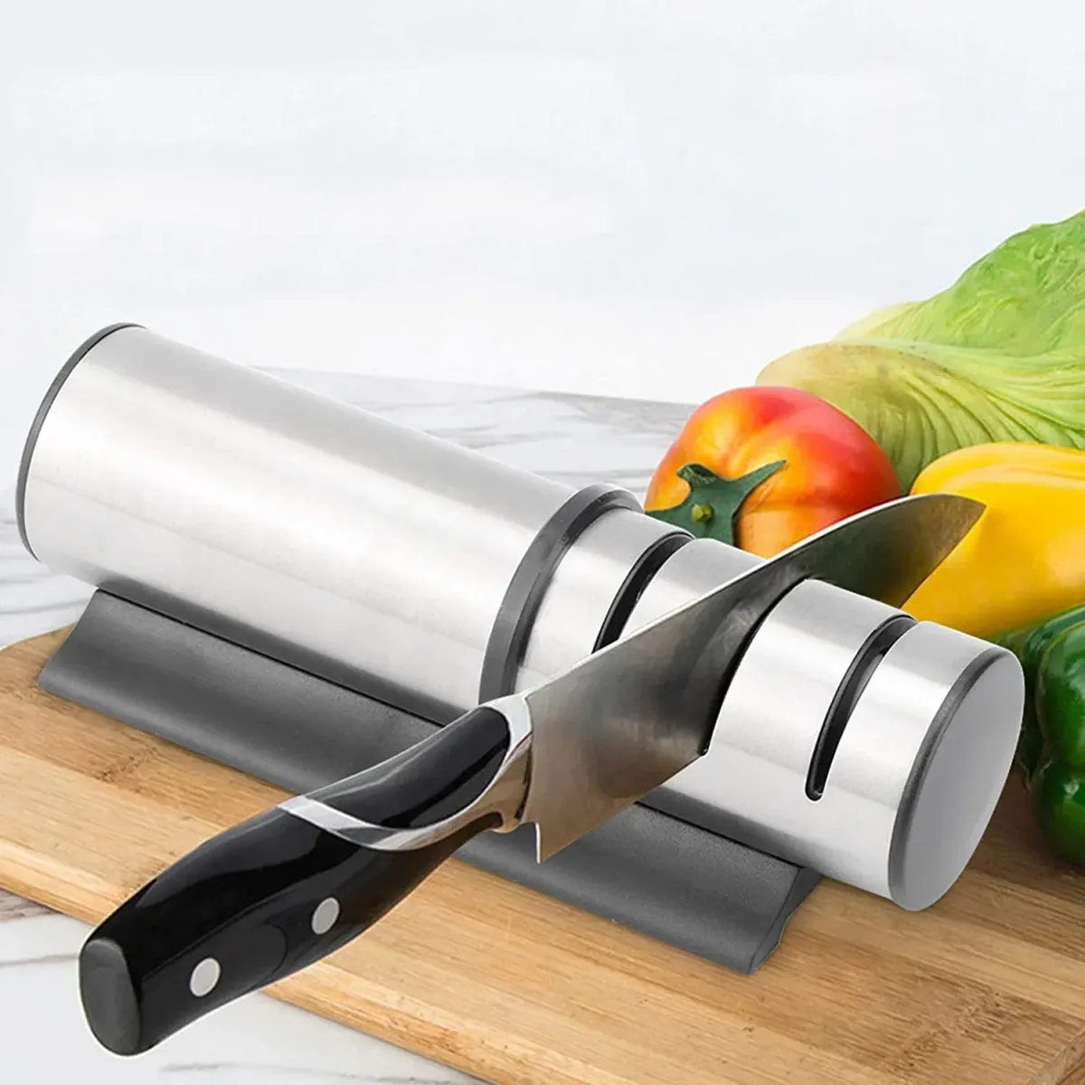 stainless steel knife sharpener on a kitchen counter