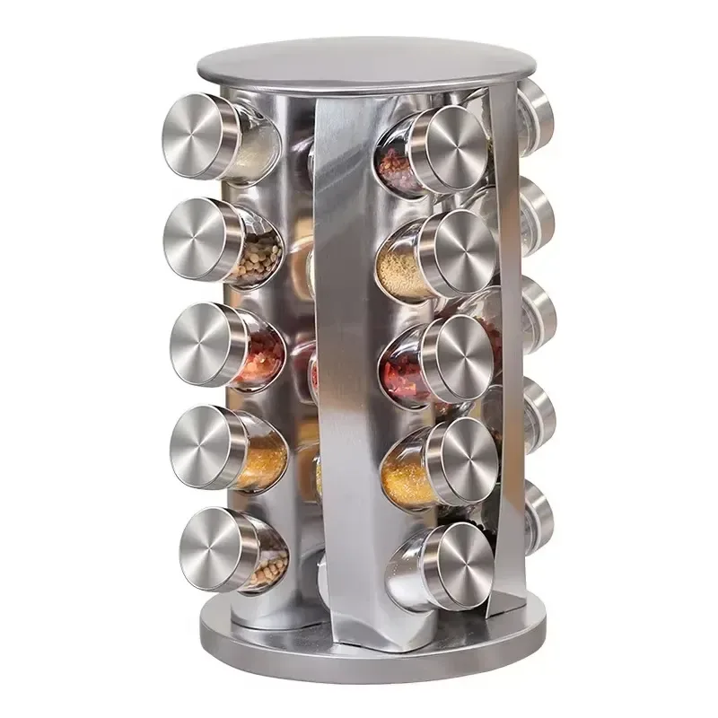glass spice jars filled with spices on a rotating stainless steel rack