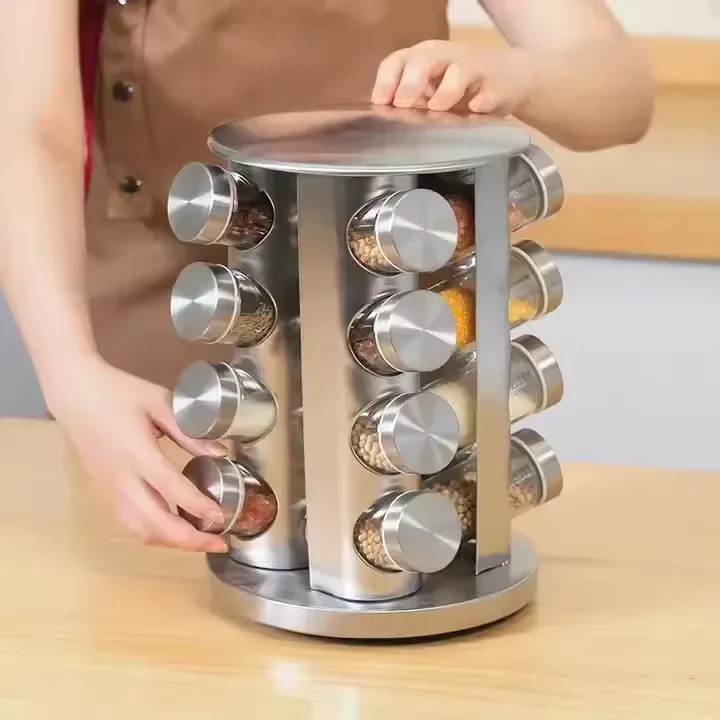 turning a rotating stainless steel spice rack by hand