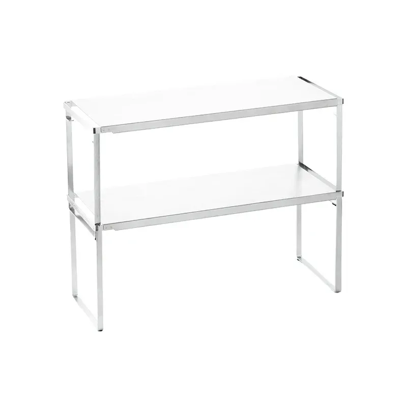 two stainless steel cabinet shelves stacked for extra levels