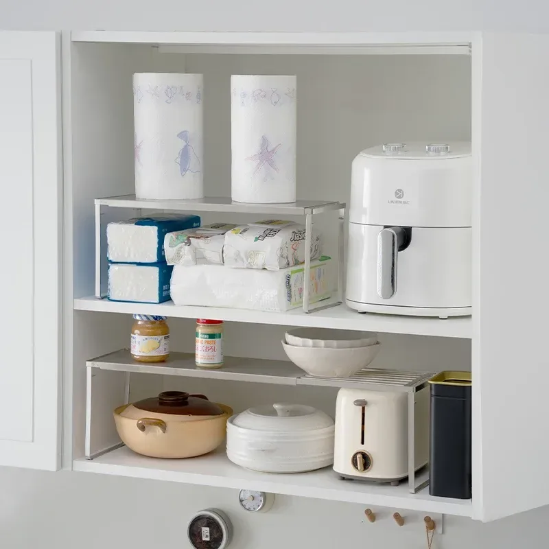 stainless steel shelves doubling the space in a kitchen cupboard